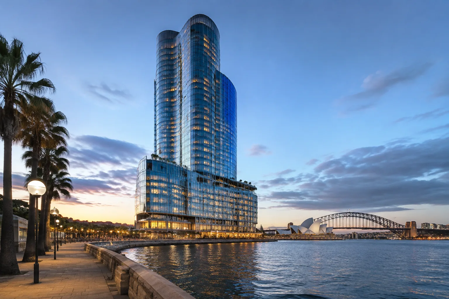 Tall glass hotel tower on Sydney Harbour foreshore