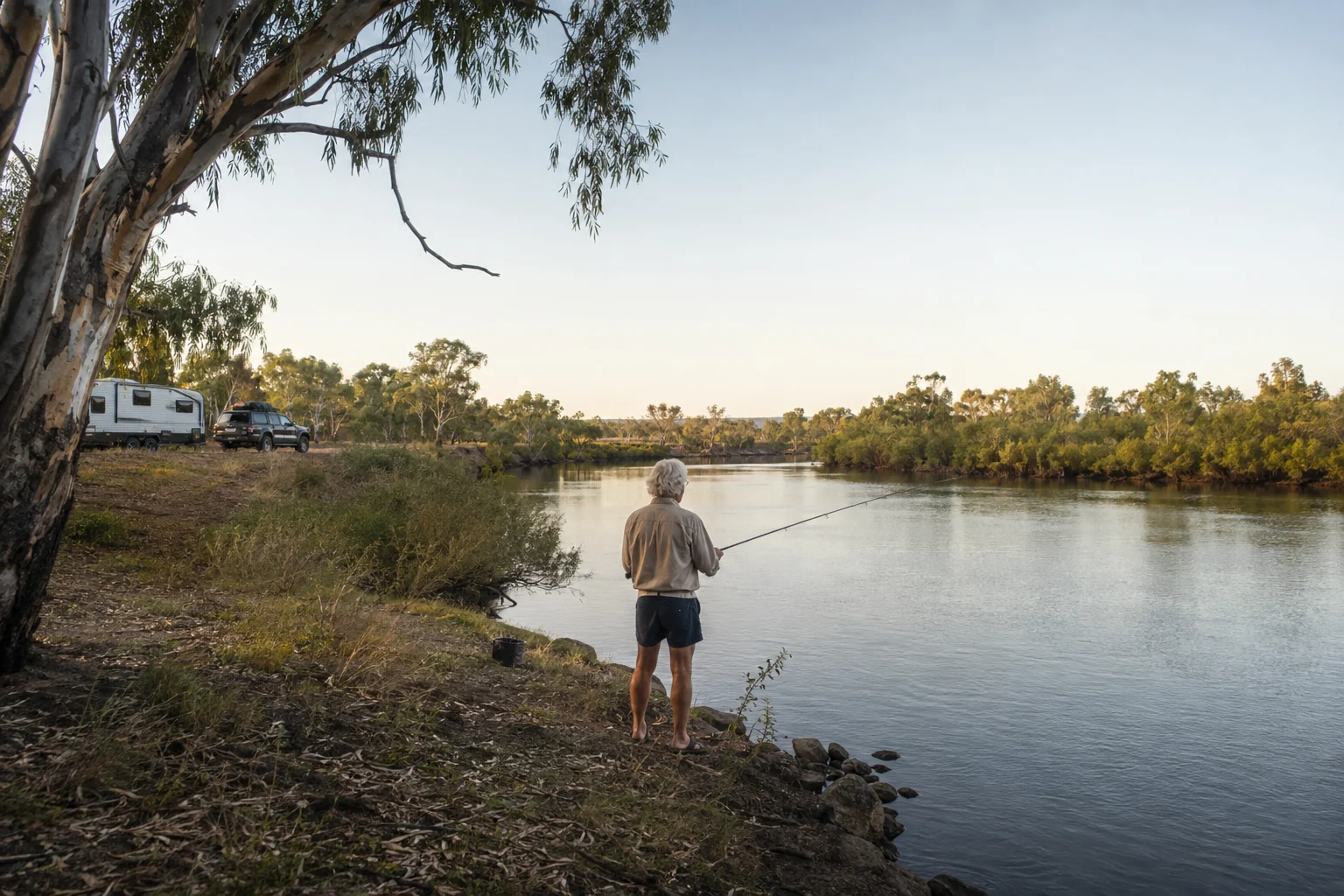 Land-based fishing from a free camp on the water