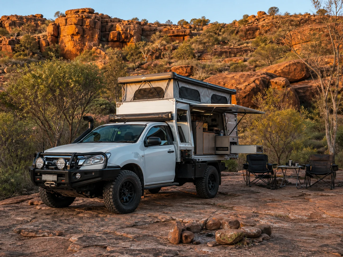 Ute with a slide-on camper mounted on the tray